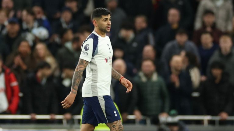 Tottenham's Cristian Romero leaves the pitch after being shown a red card during the English Premier League soccer match between Tottenham and Liverpool in London, Saturday, Dec. 20, 2025. (Ian Walton/AP)