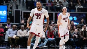 Miami Heat guard Norman Powell (24) celebrates after a 3-point basket during the second half of an NBA basketball game against the Detroit Pistons, Thursday, Jan. 1, 2026, in Detroit. (Ryan Sun/AP)