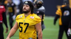Tiger-Cats re-sign lineman Revenberg; Bombers extend defensive back Holm