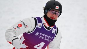 Team Canada Marion Thenault, of Sherbrooke, Que., reacts to her super final jump and third place finish on Tuesday, January 6, 2026 at the FIS freestyle world cup aerials in Lac-Beauport, Quebec. (Jacques Boissinot/CP)
