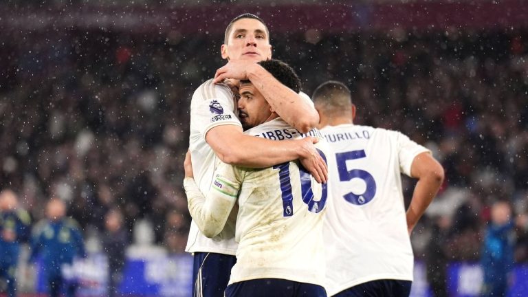 Nottingham Forest's Morgan Gibbs-White, centre, celebrates scoring during the English Premier League match between West Ham United and Nottingham Forest in London, Tuesday Jan. 6, 2026. (John Walton/PA via AP)