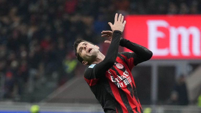 AC Milan's Christian Pulisic after missing a chance to score during the Serie A soccer match between AC Milan and Genoa, in Milan, Italy, Thursday, Jan. 8, 2026. (AP Photo/Antonio Calanni)