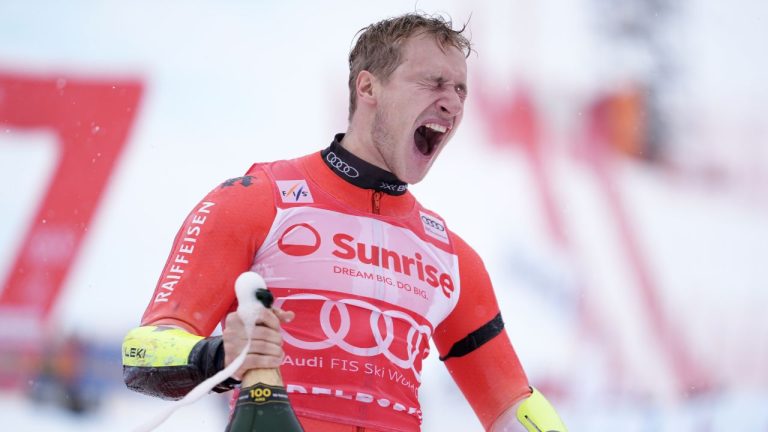 Switzerland's Marco Odermatt celebrates winning an alpine ski, men's World Cup giant slalom, in Adelboden, Switzerland, Saturday, Jan. 10, 2026. (AP Photo/Giovanni Zenoni)