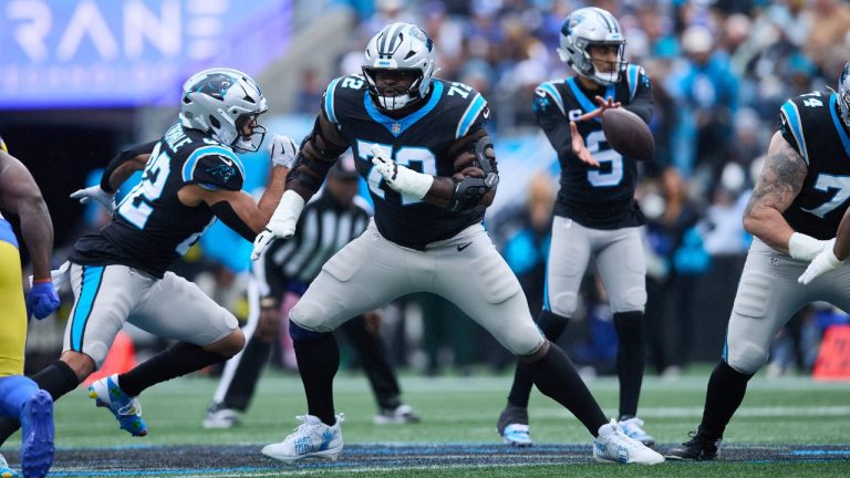 Carolina Panthers offensive tackle Ikem Ekwonu (79) looks for someone to block against the Los Angeles Rams during an NFL football game, Sunday Nov. 30, 2025, in Charlotte, N.C. (Brian Westerholt/AP)