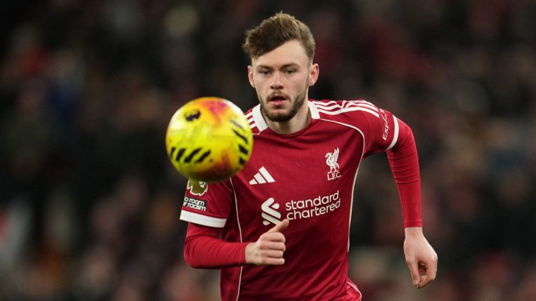 Liverpool's Conor Bradley controls the ball during the English Premier League match between Liverpool and Leeds United in Liverpool, England, Thursday, Jan. 1, 2026. (AP Photo/Jon Super)