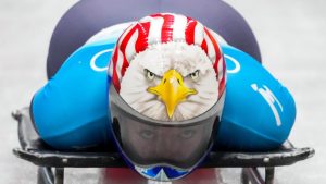 Katie Uhlaender, of United States, slides during the women's skeleton run 3 at the 2022 Winter Olympics, Saturday, Feb. 12, 2022, in the Yanqing district of Beijing. (AP Photo/Dmitri Lovetsky)