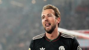 Bayern's Harry Kane reacts after missing a chance to score during the German Bundesliga soccer match between 1.FC Koeln and FC Bayern Munich in Cologne, Germany, Wednesday, Jan. 14, 2026. (AP Photo/Martin Meissner)