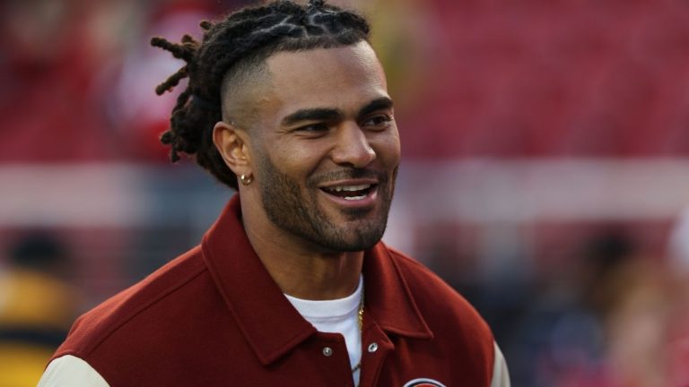 San Francisco 49ers middle linebacker Fred Warner watches players warm up before a game between the 49ers and the Chicago Bears in Santa Clara, Calif., Sunday, Dec. 28, 2025. (AP Photo/Jed Jacobsohn)