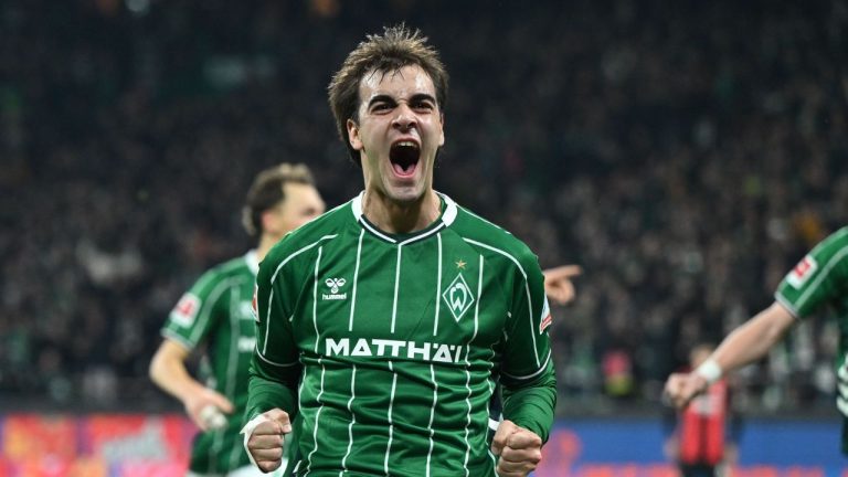 Werder Bremen's Jovan Miosevic celebrates after scoring his side's third goal during the German Bundesliga match between Werder Bremen and Eintracht Frankfurt, in Bremen, Germany, Friday, Jan. 16, 2026. (dpa via AP)