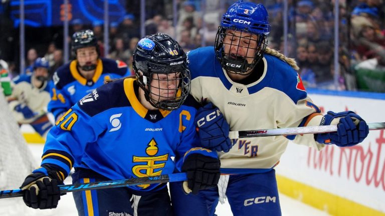 Toronto Sceptres forward Blayre Turnbull (40) checks Vancouver Goldeneyes forward Tereza Vanisova (13) during first period PWHL hockey action in Toronto, Saturday, Jan. 17, 2026. (Frank Gunn/CP)