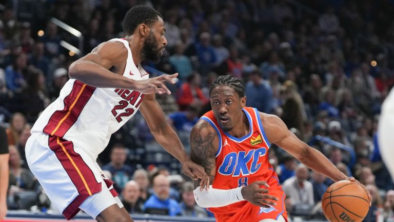 Oklahoma City Thunder guard Jalen Williams, right, drives past Miami Heat forward Andrew Wiggins during the second half of an NBA basketball game, Sunday, Jan. 11, 2026, in Oklahoma City. (Kyle Phillips/AP)
