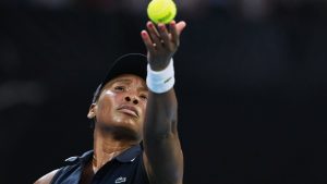 Venus Williams of the U.S. serves to Olga Danilovic of Serbia during their first round match at the Australian Open tennis championship in Melbourne, Australia, Sunday, Jan. 18, 2026. (AP Photo/Aaron Favila)