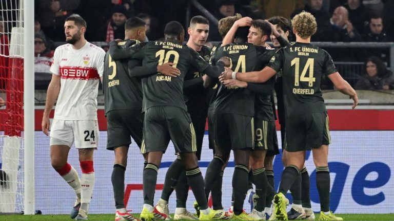 Union Berlin's players celebrate after Woo-yeong Jeong scored his side's first goal during the Bundesliga match between VfB Stuttgart and 1. FC Union Berlin, in Stuttgart, Germany, Sunday, Jan. 18, 2026. (Marijan Murat/dpa via AP)