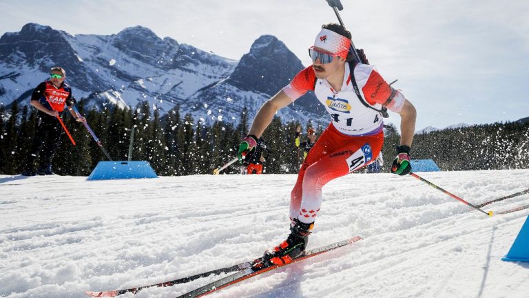 Canada's Adam Runnalls skis during the men's World Cup biathlon 12.5 km pursuit event in Canmore, Alta., Saturday, March 16, 2024. (Jeff McIntosh/CP)