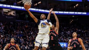 Jonathan Kuminga (1) puts up a last second layup to end the third quarter as the Golden State Warriors played the Toronto Raptors at Chase Center in San Francisco, on Tuesday, Jan. 20, 2026. (Carlos Avila Gonzalez/San Francisco Chronicle via AP)