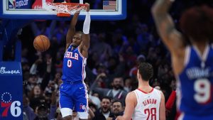Philadelphia 76ers' Tyrese Maxey dunks during overtime in an NBA game against the Houston Rockets Thursday, Jan. 22, 2026, in Philadelphia. (AP Photo/Matt Slocum)