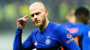 Inter Milan's Federico Dimarco celebrates after scoring his side's fourth goal during a Serie A match between Inter Milan and Pisa, in Milan, Italy, Friday, Jan. 23, 2026. (AP Photo/Luca Bruno)