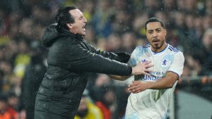 Aston Villa's head coach Unai Emery, left, argues with his player Youri Tielemans during a Europa League opening phase soccer match between Fenerbahce and Aston Villa, in Istanbul, Turkey, Thursday, Jan. 22, 2026. (AP Photo/Francisco Seco)