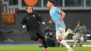 Lazio's Danilo Cataldi, right, celebrates after scoring his side's third goal during the Serie A match between Lazio and Genoa in Rome, Italy, Friday, Jan. 30, 2026. (AP Photo/Gregorio Borgia)
