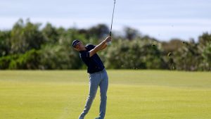 Justin Rose, of England, hits from the 17th fairway while playing the South Course at Torrey Pines during the second round of the Farmers Insurance Open golf tournament Friday, Jan. 30, 2026, in San Diego. (AP Photo/Caroline Brehman)