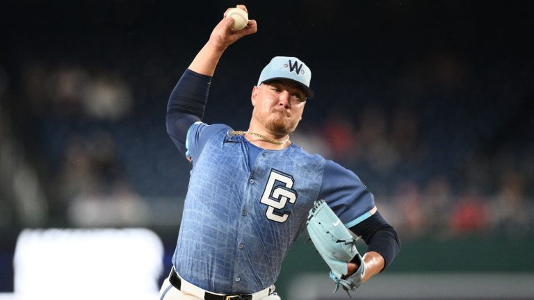 Washington Nationals starting pitcher Cade Cavalli throws during the first inning of a baseball game against the Chicago White Sox, Friday, Sept. 26, 2025, in Washington. (AP Photo/Nick Wass)