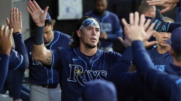 Tampa Bay Rays' Tristan Gray celebrates with teammates after scoring on a one-run single by Chandler Simpson during the second inning of a baseball game against the Chicago White Sox in Chicago, Tuesday, Sept. 9, 2025. (Nam Y. Huh/AP)