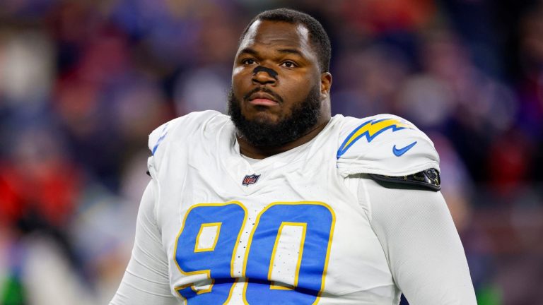 Los Angeles Chargers defensive tackle Teair Tart (90) reacts during the first half of an NFL wild card playoff football game against the New England Patriots, Sunday, Jan. 11, 2026, in Foxborough, Mass. (Greg M. Cooper/AP)