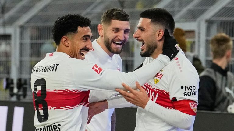 Stuttgart's Deniz Undav, right, and teammates celebrate their side's equalizing goal during the German Bundesliga soccer match between Borussia Dortmund and VfB Stuttgart in Dortmund, Germany, Saturday, Nov. 22, 2025. (Martin Meissner/AP)