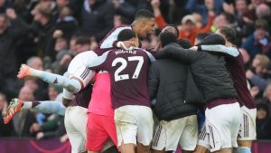Aston Villa players celebrate after Aston Villa's Emiliano Buendia scored his side's second goal during the English Premier League soccer match between Aston Villa and Arsenal in Birmingham, England, Saturday, Dec. 6, 2025. (Dave Shopland/AP)