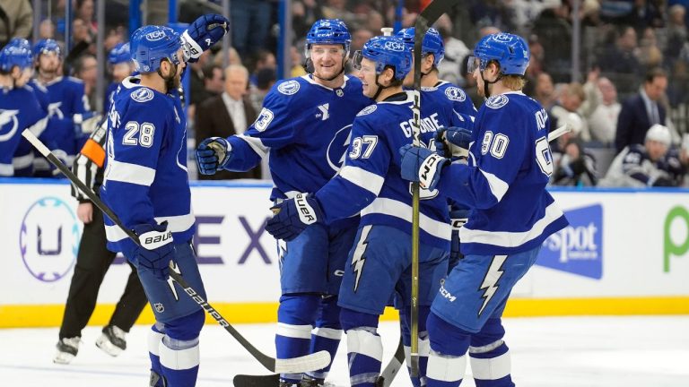 Tampa Bay Lightning defenceman Darren Raddysh (43) celebrates his goal against the Winnipeg Jets with teammates, during the second period of an NHL hockey game Thursday, Jan. 29, 2026, in Tampa, Fla. (Chris O'Meara/AP)