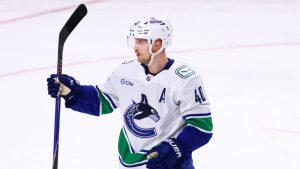 Vancouver Canucks centre Elias Pettersson celebrates his goal during the third period of an NHL hockey game against the Buffalo Sabres Tuesday, Jan. 6, 2026, in Buffalo, N.Y. (Jeffrey T. Barnes/AP)