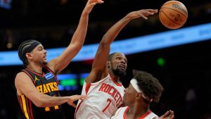 Houston Rockets forward Kevin Durant (7) and Atlanta Hawks forward Asa Newell (14) during the second half of an NBA basketball game, Thursday, Jan. 29, 2026, in Atlanta. (Mike Stewart/AP)