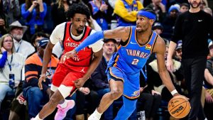 Oklahoma City Thunder guard Shai Gilgeous-Alexander (2) drives against New Orleans Pelicans forward Herbert Jones (2) during the second half of an NBA basketball game Tuesday, Jan. 27, 2026, in Oklahoma City. (Gerald Leong/AP)