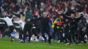 Benfica's head coach Jose Mourinho celebrates at the end of a Champions League opening phase soccer match between Benfica and Real Madrid, in Lisbon, Wednesday, Jan. 28, 2026. (Armando Franca/AP)