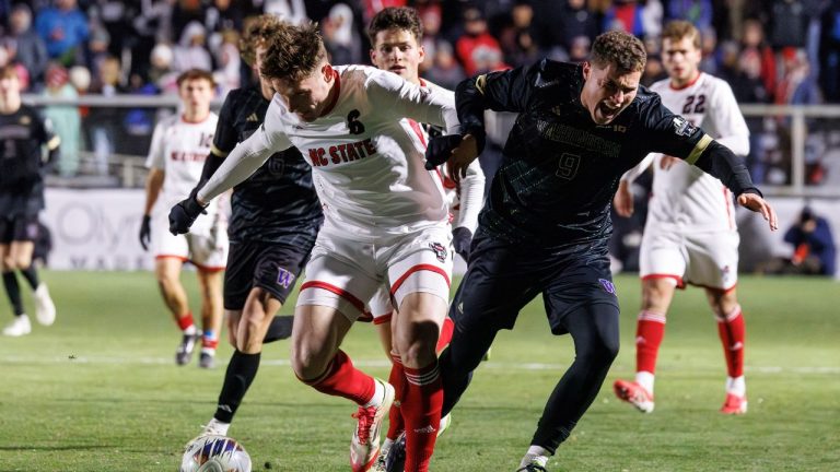 North Carolina State's Nikola Markovic (6) and Washington's Charlie Kosakoff, right, battle for the ball during the second half of the NCAA College Cup National Championship soccer final in Cary, N.C., Monday, Dec. 15, 2025. (Ben McKeown/AP)