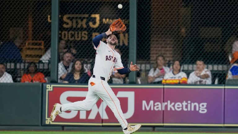 Former Houston Astros centre fielder Chas McCormick catches a fly ball by Colorado Rockies' Warming Bernabel during the eighth inning of a baseball game Thursday, Aug. 28, 2025, in Houston. (David J. Phillip/AP)