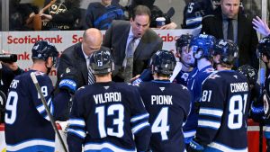 Winnipeg Jets head coach Scott Arniel talks to his players during third period NHL action against the Edmonton Oilers in Winnipeg on Monday December 29, 2025. (Fred Greenslade/CP)