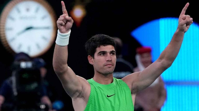 Carlos Alcaraz of Spain celebrates after defeating Alexander Zverev of Germany in their semifinal match at the Australian Open tennis championship in Melbourne, Australia. (Aaron Favila/AP)