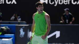 Carlos Alcaraz of Spain reacts after winning his fourth round match against Tommy Paul of the U.S. at the Australian Open tennis championship in Melbourne, Australia, Sunday, Jan. 25, 2026. (Dita Alangkara/AP Photo)