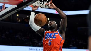 Oklahoma City Thunder guard Lu Dort dunks in the second half of an NBA basketball game against the Memphis Grizzlies, Friday, Jan. 9, 2026, in Memphis, Tenn. (Brandon Dill/AP Photo)