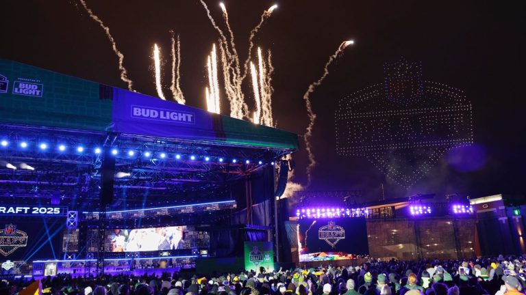 Fans watch a firework and drone show after the third round of the NFL draft, Friday, April 25, 2025, in Green Bay, Wis. (AP/Matt Ludtke)