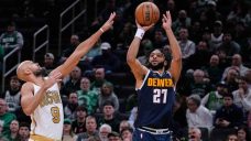 Murray scores 22 with 17 assists to help Nuggets snap Celtics’ win streak