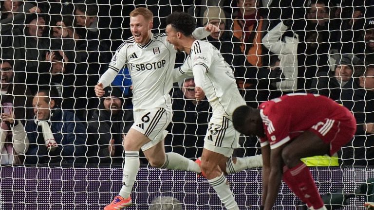 Fulham's Harrison Reed, left, celebrates after scoring his side's second goal during the English Premier League match between Fulham and Liverpool in London, Sunday, Jan. 4, 2026. (AP/Alastair Grant)
