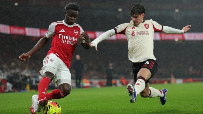 Liverpool's Milos Kerkez blocks Arsenal's Bukayo Saka during the English Premier League soccer match between Arsenal and Liverpool in London, Thursday, Jan. 8, 2026. (Ian Walton/AP)
