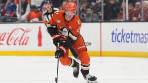 Anaheim Ducks defenceman Jackson LaCombe brings the puck up the ice during the first period of an NHL hockey game against the New York Rangers Monday, Jan. 19, 2026, in Anaheim, Calif. (Gregory Bull/AP)