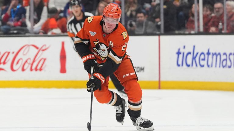 Anaheim Ducks defenceman Jackson LaCombe brings the puck up the ice during the first period of an NHL hockey game against the New York Rangers Monday, Jan. 19, 2026, in Anaheim, Calif. (Gregory Bull/AP)