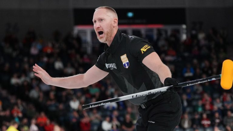 Skip Brad Jacobs yells directions to his sweepers during Canadian Olympic curling trials action against Team Gushue in Halifax on Wednesday, November 26, 2025. (Darren Calabrese/THE CANADIAN PRESS)