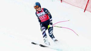 United States' Lindsey Vonn approaches the finish area after crashing, during an alpine ski, women’s World Cup downhill, in Crans Montana. (Jean-Christophe Bott/AP)