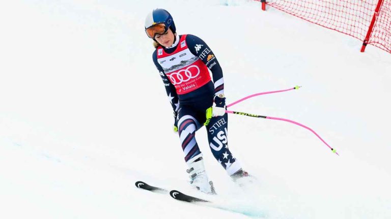 United States' Lindsey Vonn approaches the finish area after crashing, during an alpine ski, women’s World Cup downhill, in Crans Montana. (Jean-Christophe Bott/AP)