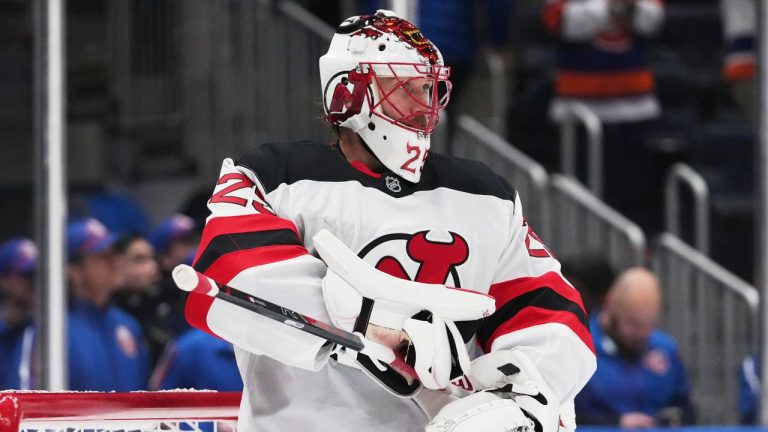 New Jersey Devils goaltender Jacob Markstrom (25) reacts after New York Islanders' Casey Cizikas (53) scored a goal during the third period of an NHL hockey game Tuesday, Jan. 6, 2026, in Elmont, N.Y. (Frank Franklin II/AP Photo)